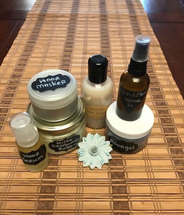 diverse DIY producten voor het haar, zoals haarmasker, haarserum, shampoo, haarlak, gel en stylingbalsem